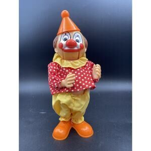 Vintage Bright Colorful Plastic Mechanical Belly Buster Clown Bank. Tested